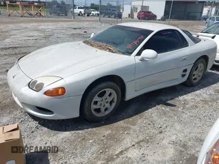 1997 Mitsubishi 3000GT z VIN JA3AM44H8VY006247, wystawiony jako IAAI lot #42233155 z przebiegiem 135 479 mil mil oraz . Historia ofert i sprzedaży dostępna na DreamBid. Obrazek 2.