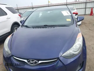 2013 Hyundai Elantra GLS z VIN 5NPDH4AE7DH161174, wystawiony jako IAAI lot #41785607 z przebiegiem 166 483 mil mil oraz . Historia ofert i sprzedaży dostępna na DreamBid. Obrazek 12.