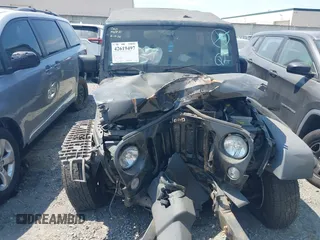2017 Jeep Wrangler Unlimited Sport with VIN 1C4HJWDG1HL551090, listed as a IAAI auction lot 42619497 with 92,693 mi miles and . Bid and sale history available at DreamBid. Image 12.