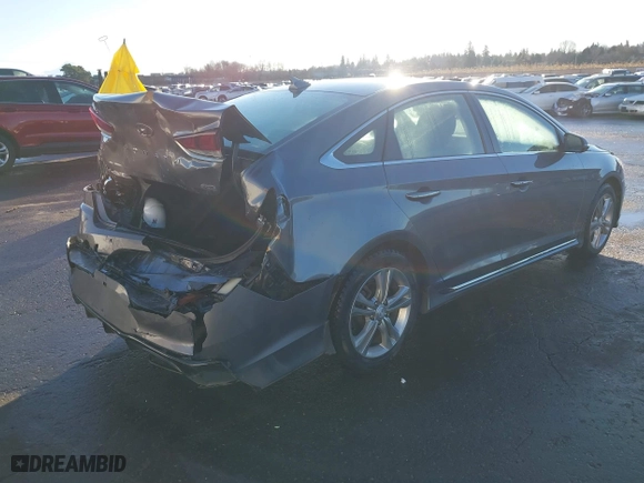 2019 Hyundai Sonata Sport with VIN 5NPE34AFXKH800205, listed as a IAAI auction lot 41227546 with 82,850 mi miles. Bid and sale history available at carsss.com. Image 4.