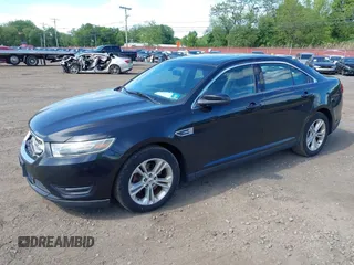 2015 Ford Taurus SEL with VIN 1FAHP2E88FG181055, listed as a IAAI auction lot 42307640 with 104,702 mi miles and . Bid and sale history available at DreamBid. Image 2.