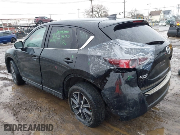 2018 Mazda CX-5 Touring with VIN JM3KFBCMXJ0450040, listed as a IAAI auction lot 41650824 with 83,133 mi miles. Bid and sale history available at carsss.com. Image 3.