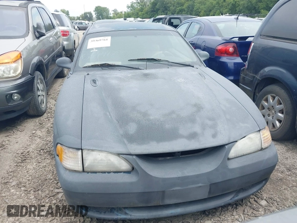1997 Ford Mustang with VIN 1FALP4043VF158166, listed as a IAAI auction lot 39369761 with 124,992 mi miles. Bid and sale history available at carsss.com. Image 6.