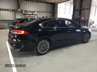 2018 Ford Fusion Titanium с VIN 3FA6P0D9XJR241506, выставлен на аукционе Copart как лот 60736525 с пробегом 109 548 миль миль и Списание • Salvage title. История ставок и продаж доступна на DreamBid. Изображение 3.