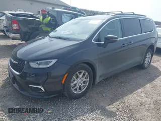 2022 Chrysler Pacifica Touring L with VIN 2C4RC1BG3NR181915, listed as a IAAI auction lot 41946833 with 69,590 mi miles and . Bid and sale history available at DreamBid. Image 2.