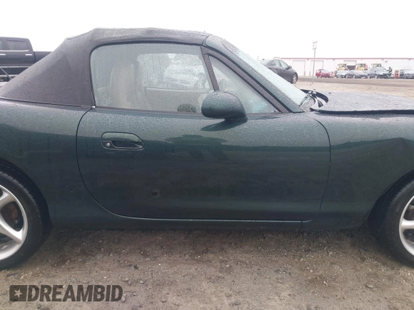 1999 Mazda MX-5 Miata with VIN JM1NB3539X0123231, listed as a IAAI auction lot 42314156 with 154,755 mi miles and . Bid and sale history available at DreamBid. Image 13.