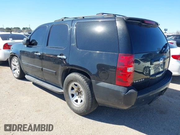 2007 Chevrolet Tahoe LTZ with VIN 1GNFC13J67R245233, listed as a IAAI auction lot 41726159 with 203,841 mi miles and . Bid and sale history available at DreamBid. Image 3.