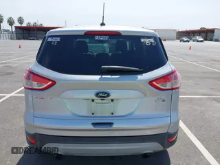 2015 Ford Escape SE with VIN 1FMCU9G93FUA26339, listed as a IAAI auction lot 42039281 with 185,729 mi miles and . Bid and sale history available at DreamBid. Image 17.