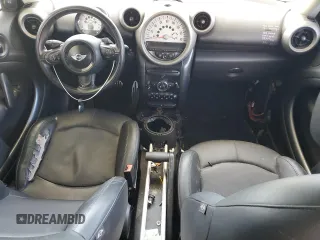 2012 MINI Countryman S z VIN WMWZC3C58CWL85765, wystawiony jako Copart lot #55291025 z przebiegiem 188 894 mil mil oraz Szkody całkowita. Historia ofert i sprzedaży dostępna na DreamBid. Obrazek 8.