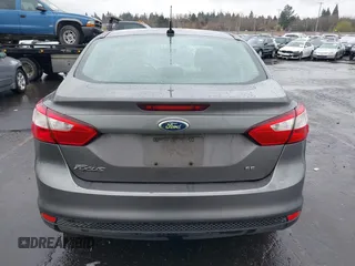 2012 Ford Focus SE with VIN 1FAHP3F24CL217777, listed as a IAAI auction lot 41831391 with 218,308 mi miles. Bid and sale history available at carsss.com. Image 17.