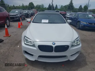 2015 BMW M6 z VIN WBS6C9C50FD467538, wystawiony jako IAAI lot #42366043 z przebiegiem 66 379 mil mil oraz . Historia ofert i sprzedaży dostępna na DreamBid. Obrazek 12.