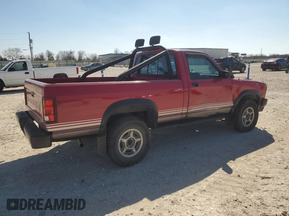 1989 Dodge Dakota z VIN 1B7GG66X6KS127702, wystawiony jako Copart lot #43276685 z przebiegiem 121 862 mil mil oraz Czysty tytuł • Clean title. Historia ofert i sprzedaży dostępna na DreamBid. Obrazek 3.