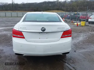 2014 Buick LaCrosse Premium II with VIN 1G4GF5G39EF305460, listed as a IAAI auction lot 41951229 with 127,188 mi miles and . Bid and sale history available at DreamBid. Image 16.