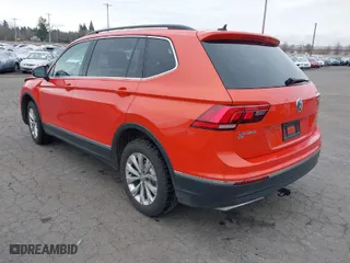 2018 Volkswagen Tiguan SEL with VIN 3VV2B7AX2JM006115, listed as a IAAI auction lot 41758870 with 87,286 mi miles. Bid and sale history available at carsss.com. Image 3.