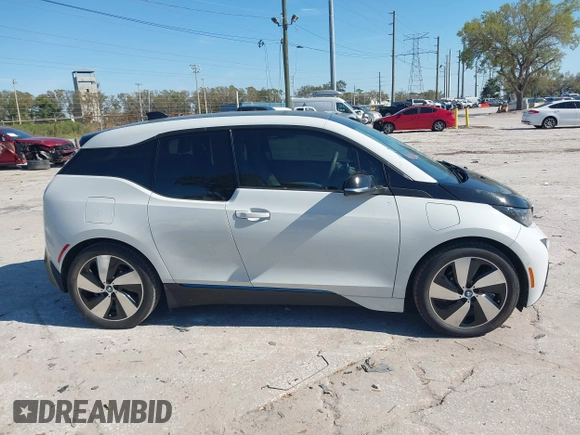 2017 BMW i3 z VIN WBY1Z8C55HV550906, wystawiony jako IAAI lot #41705056 z przebiegiem 79 566 mil mil oraz . Historia ofert i sprzedaży dostępna na DreamBid. Obrazek 13.