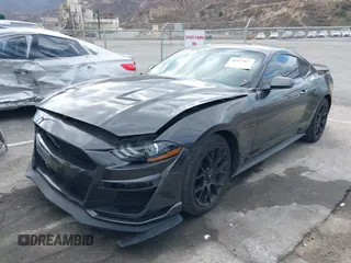 2018 Ford Mustang EcoBoost z VIN 1FA6P8THXJ5154523, wystawiony jako IAAI lot #41523923 z przebiegiem 94 330 mil mil oraz . Historia ofert i sprzedaży dostępna na DreamBid. Obrazek 18.