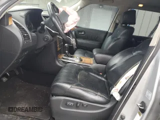 2011 Infiniti QX56 8-passenger with VIN JN8AZ2NC9B9301975, listed as a Copart auction lot 62284234 with 194,441 mi miles and Salvage Title. Bid and sale history available at carsss.com. Image 7.