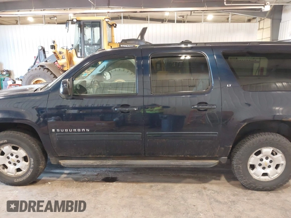 2009 Chevrolet Suburban LT w/1LT with VIN 1GNFK26319R272557, listed as a IAAI auction lot 42138238 with 223,599 mi miles. Bid and sale history available at carsss.com. Image 14.