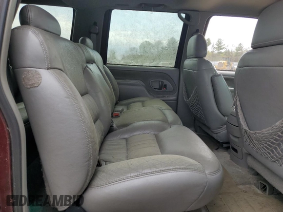 1999 Chevrolet Suburban z VIN 1GNFK16R2XJ328550, wystawiony jako Copart lot #53179525 z przebiegiem 170 914 mil mil oraz Czysty tytuł • Clean title. Historia ofert i sprzedaży dostępna na DreamBid. Obrazek 11.