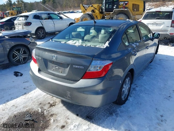 2012 Honda Civic Hybrid with VIN JHMFB4F35CS003299, listed as a IAAI auction lot 41509713 with 144,024 mi miles. Bid and sale history available at carsss.com. Image 4.