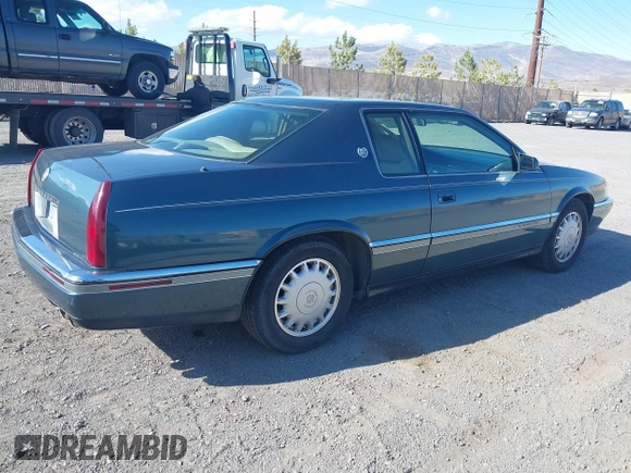 1993 Cadillac Eldorado ESC z VIN 1G6EL12Y4PU609197, wystawiony jako IAAI lot #41902066 z przebiegiem 96 251 mil mil oraz . Historia ofert i sprzedaży dostępna na DreamBid. Obrazek 4.