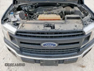 2018 Ford F-150 XL with VIN 1FTMF1CB9JKC79358, listed as a Copart auction lot 57774995 with 112,543 mi miles and Salvage title. Bid and sale history available at DreamBid. Image 11.