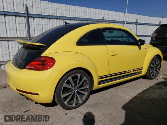 2014 Volkswagen Beetle Turbo R-Line with VIN 3VWVT7AT8EM618182, listed as a Copart auction lot 73380874 with 51,373 mi miles and Salvage Title. Bid and sale history available at DreamBid. Image 3.
