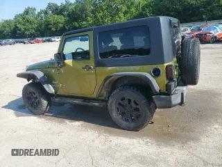2010 Jeep Wrangler Sahara with VIN 1J4AA5D16AL203910, listed as a Copart auction lot 62891315 with 124,337 mi miles and Salvage title. Bid and sale history available at DreamBid. Image 2.