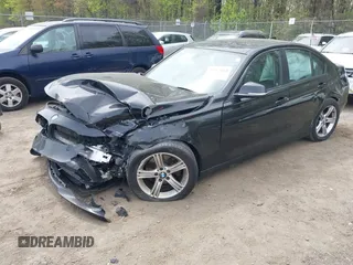 2014 BMW 3 Series 320i xDrive with VIN WBA3C3C59EF984070, listed as a IAAI auction lot 42063569 with 169,002 mi miles and . Bid and sale history available at DreamBid. Image 2.