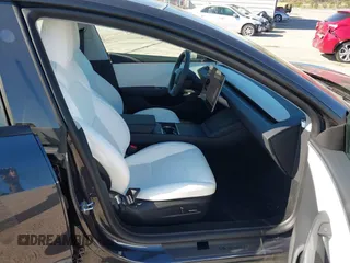 2025 Tesla Model 3 Long Range with VIN 5YJ3E1EA2SF910890, listed as a IAAI auction lot 41791583 with Not Provided miles and . Bid and sale history available at DreamBid. Image 5.