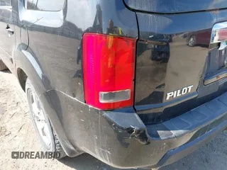 2009 Honda Pilot EX-L with VIN 5FNYF48529B035128, listed as a IAAI auction lot 42006450 with 214,069 mi miles. Bid and sale history available at carsss.com. Image 14.