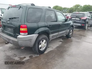 2001 Ford Escape XLT with VIN 1FMCU03101KC25039, listed as a IAAI auction lot 41900122 with 218,126 mi miles. Bid and sale history available at carsss.com. Image 4.