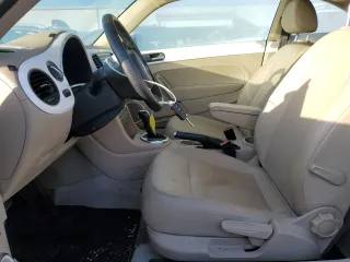 2014 Volkswagen Beetle 2.5L w/Sun with VIN 3VWJP7AT8EM610831, listed as a Copart auction lot 84318174 with 136,931 mi miles and Salvage Title. Bid and sale history available at DreamBid. Image 7.