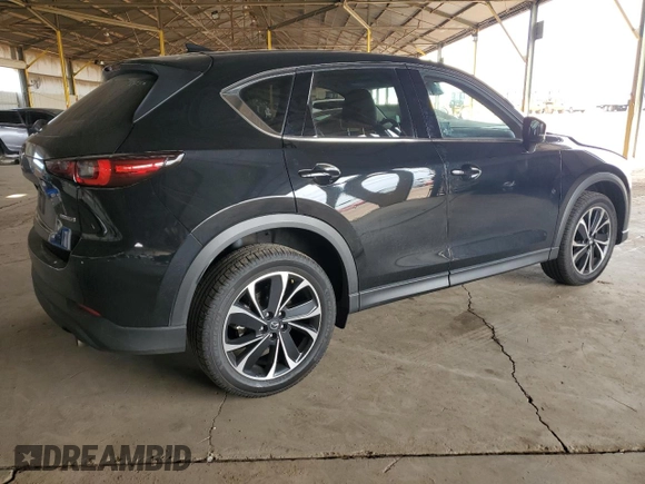 2023 Mazda CX-5 2.5 S Premium Plus Package with VIN JM3KFBEM2P0217307, listed as a Copart auction lot 44818595 with 64,219 mi miles and Salvage Title. Bid and sale history available at carsss.com. Image 3.