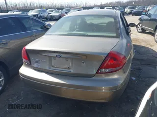 2004 Ford Taurus SE with VIN 1FAFP532X4G152810, listed as a IAAI auction lot 41639876 with 98,718 mi miles and . Bid and sale history available at DreamBid. Image 16.