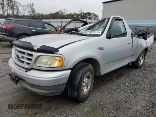 2003 Ford F-150 XL with VIN 1FTRF172X3NB77391, listed as a Copart auction lot 80657174 with Not Provided miles and Salvage Title. Bid and sale history available at DreamBid. Image 1.