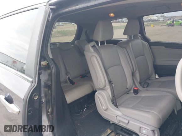 2018 Honda Odyssey EX-L z VIN 5FNRL6H72JB090127, wystawiony jako IAAI lot #42167788 z przebiegiem 114 984 mil mil oraz . Historia ofert i sprzedaży dostępna na DreamBid. Obrazek 8.
