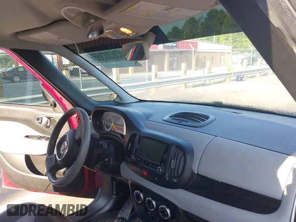 2014 FIAT 500L Easy with VIN ZFBCFABH9EZ020600, listed as a IAAI auction lot 42626910 with 84,552 mi miles and . Bid and sale history available at DreamBid. Image 5.