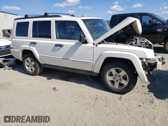 2006 Jeep Commander with VIN 1J8HG48N26C123370, listed as a Copart auction lot 42310645 with 94,985 mi miles and Salvage title. Bid and sale history available at DreamBid. Image 4.