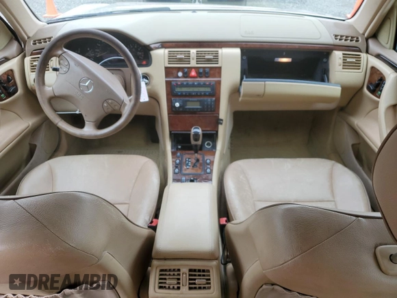 2001 Mercedes-Benz E-Class with VIN WDBJF65J51B378052, listed as a Copart auction lot 55057915 with 228,896 mi miles and Salvage Title. Bid and sale history available at carsss.com. Image 8.