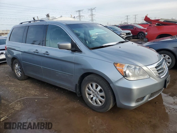 2010 Honda Odyssey EX-L with VIN 5FNRL3H69AB001952, listed as a Copart auction lot 49738155 with 95,721 mi miles and Salvage Title. Bid and sale history available at carsss.com. Image 4.