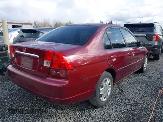 2003 Honda Civic LX with VIN 2HGES16553H558405, listed as a IAAI auction lot 41946031 with 127,145 mi miles. Bid and sale history available at carsss.com. Image 4.