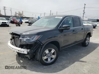 2025 Honda Ridgeline RTL with VIN 5FPYK3F52SB014785, listed as a Copart auction lot 59982875 with 2,341 mi miles and Salvage title. Bid and sale history available at DreamBid. Image 1.