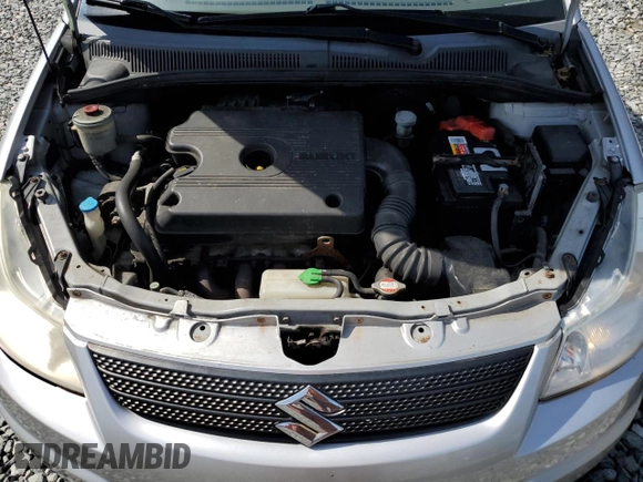 2007 Suzuki SX4 z VIN JS2YB413175106909, wystawiony jako Copart lot #55733055 z przebiegiem 152 703 mil mil oraz Tytuł czysty. Historia ofert i sprzedaży dostępna na DreamBid. Obrazek 11.