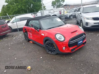2019 MINI Convertible Cooper S z VIN WMWWG9C51K3E39565, wystawiony jako IAAI lot #42125546 z przebiegiem 58 634 mil mil oraz . Historia ofert i sprzedaży dostępna na DreamBid. Obrazek 1.