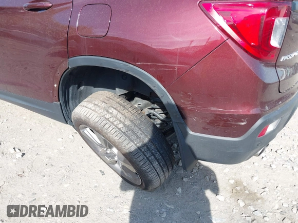 2021 Honda Passport Touring z VIN 5FNYF8H91MB022986, wystawiony jako IAAI lot #42077321 z przebiegiem 20 497 mil mil oraz . Historia ofert i sprzedaży dostępna na DreamBid. Obrazek 6.