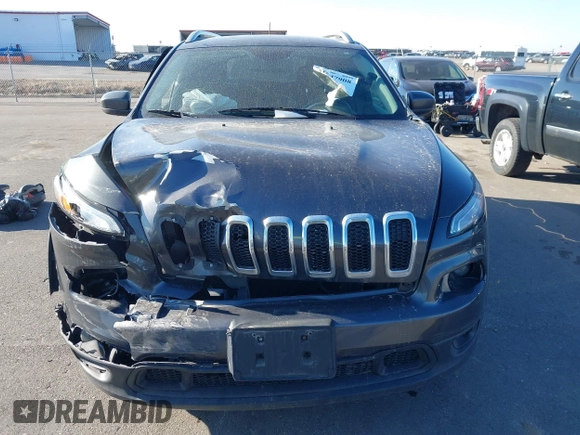 2016 Jeep Cherokee Latitude with VIN 1C4PJMCB8GW162224, listed as a IAAI auction lot 41847908 with 141,642 mi miles and . Bid and sale history available at carsss.com. Image 12.