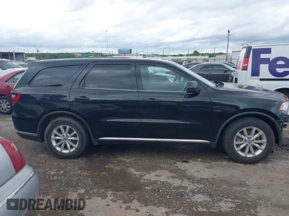 2014 Dodge Durango SXT with VIN 1C4RDHAG7EC560366, listed as a IAAI auction lot 42152736 with 164,590 mi miles and . Bid and sale history available at carsss.com. Image 14.