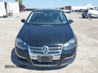 2008 Volkswagen Jetta Sedan Wolfsburg with VIN 3VWRJ71K08M175125, listed as a IAAI auction lot 42087215 with 150,813 mi miles. Bid and sale history available at carsss.com. Image 6.