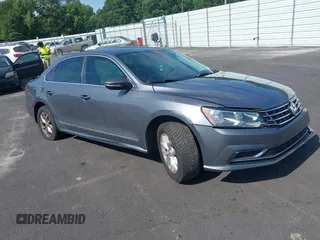 2016 Volkswagen Passat S with VIN 1VWAT7A30GC013544, listed as a IAAI auction lot 42643834 with 163,000 mi miles and . Bid and sale history available at DreamBid. Image 1.